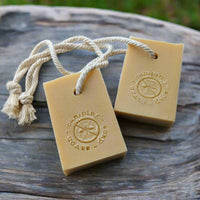 This natural soap bar, made with citronella, lemongrass, and eucalyptus essential oils, helps keep the bugs away. Its "soap on a rope" design is perfect for campers!