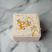 Relax and unwind with the Chamomile Mineral Bath Bomb. Scented with lemon, cedarwood, and eucalyptus essential oils for&nbsp;a truly renewing spa-like experience.